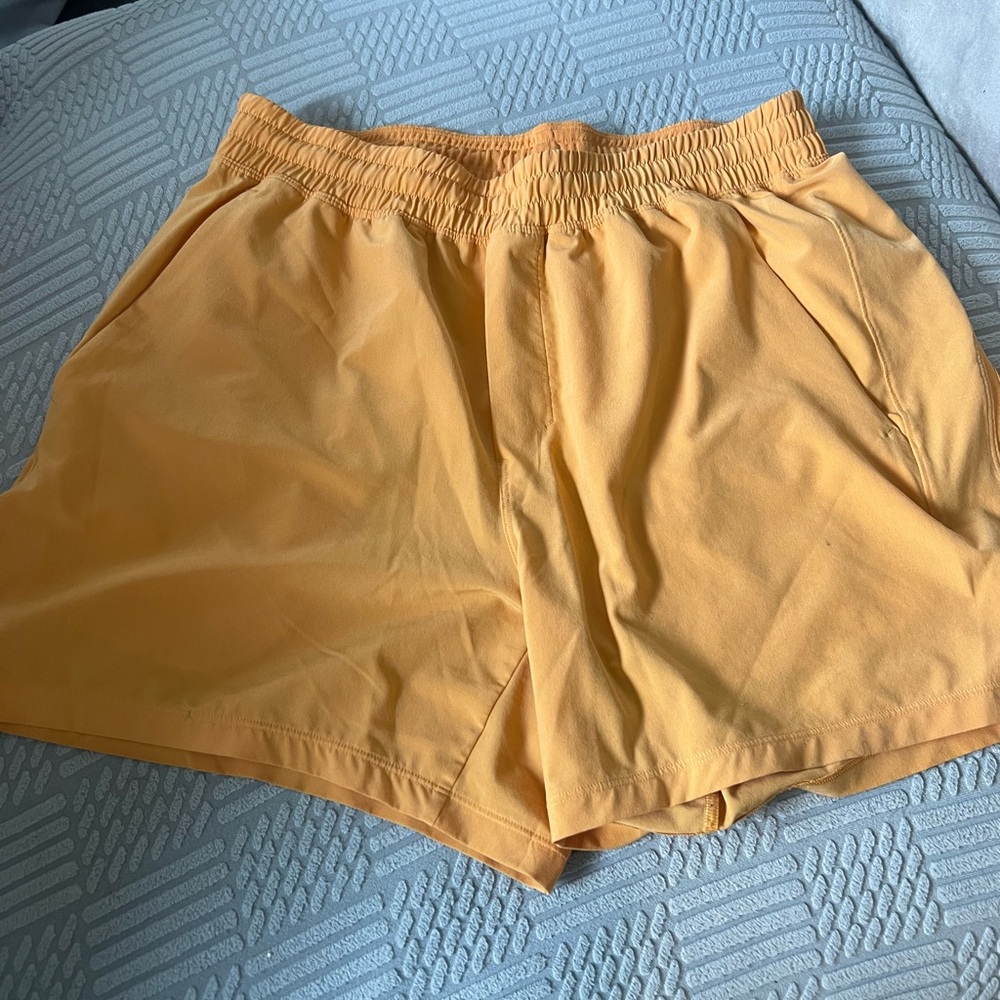 lululemon athletica orange men’s shorts